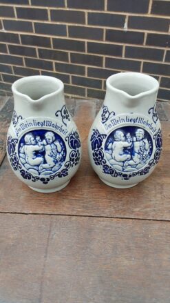 Pair of decorative 1/2 Litre ceramic Jugs